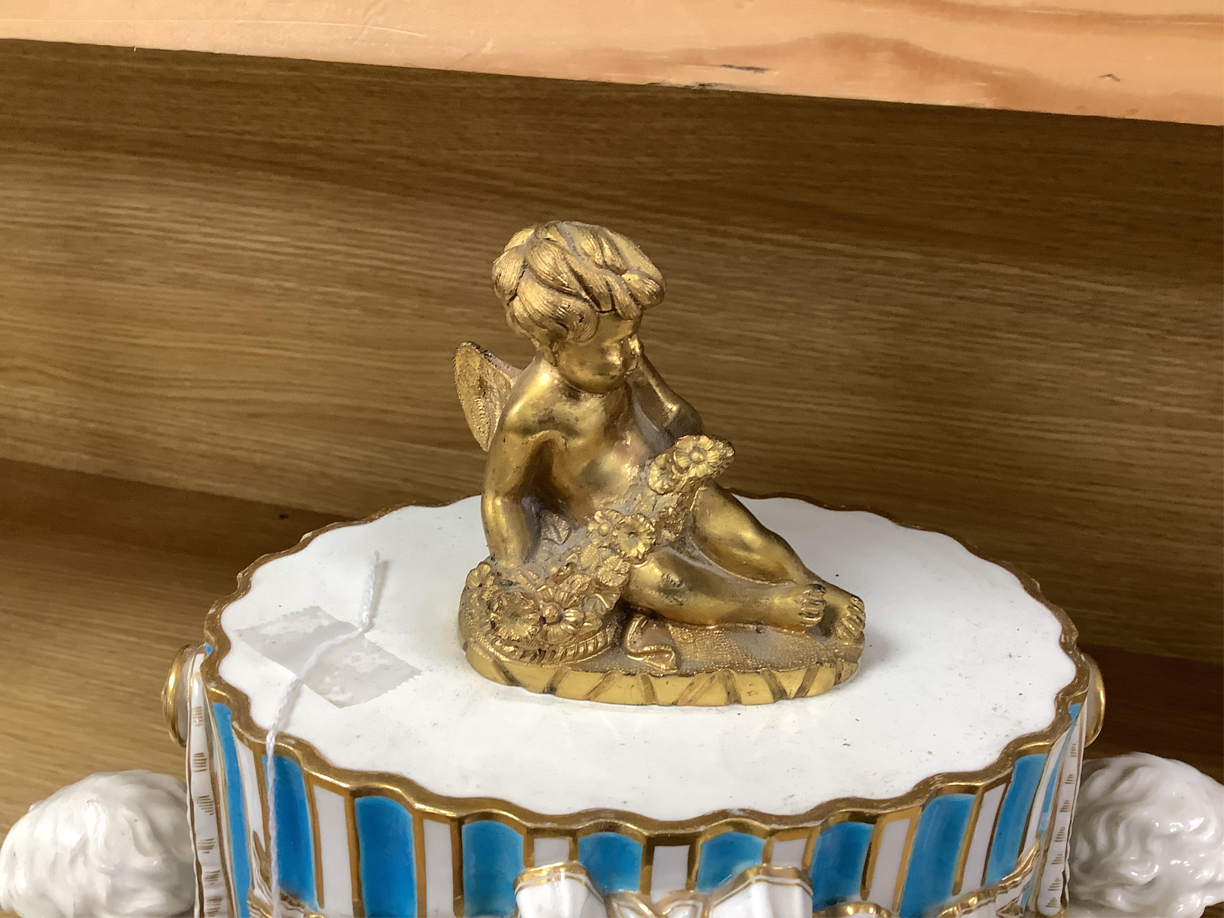A 19th-century Sevres style porcelain mantel clock, 29cm tall